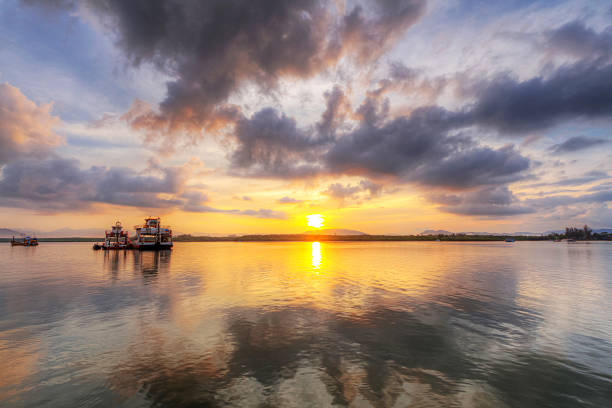Yacht at the pier on Lake Ladoga at sunset