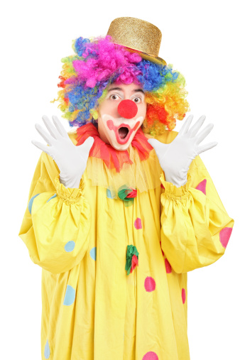 Funny clown gesturing with hands isolated on white background