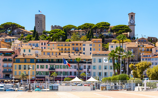 Cannes, France - July 31, 2022: Castle Hill panorama Eglise Notre Dame dEsperance church over historic old town Centre Ville quarter and yacht port of Cannes