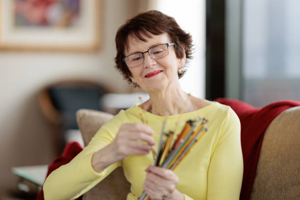 istock Senior woman choosing which knitting needle to use 1605156621