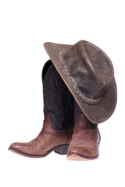 istock Cowboy boots and hat on a white background 160515798