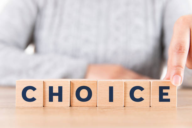 istock Choice Word with Wooden Blocks 1605189488