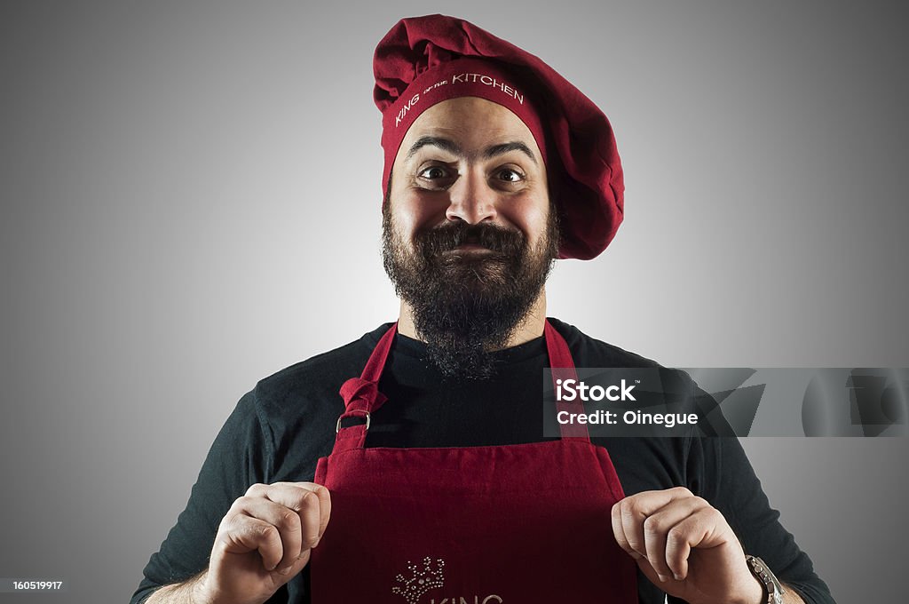 happy bearded chubby chef hppy bearded chubby chef on grey background Adult Stock Photo