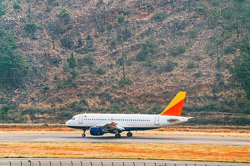 Airplane landing in Bhutan Paro International airport