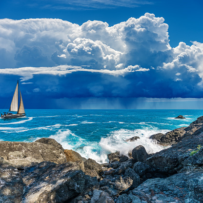 Beautiful seascape and cliffs with storm clouds (cumulonimbus) and torrential rain. Mediterranean sea (Ligurian sea), Cinque Terre, La Spezia, Liguria, Italy, Europe.