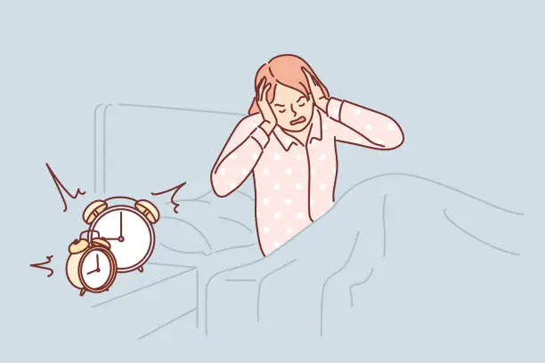 Vector illustration of Woman wakes up with difficulty early in morning sitting in bed near bedside table with alarm clock