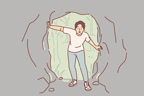 Vector illustration of Man enters cave and looks up intrigued as takes part in exploration trip to national park
