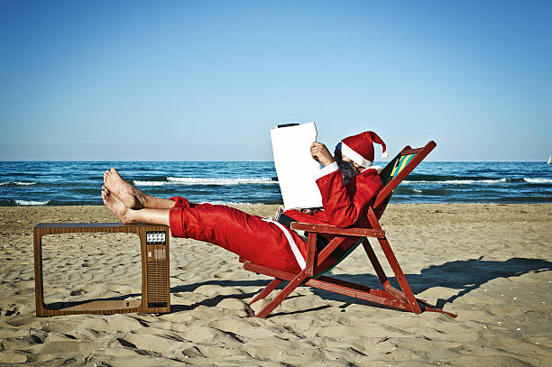 istock Santa Claus chilling out on a beach 160525636