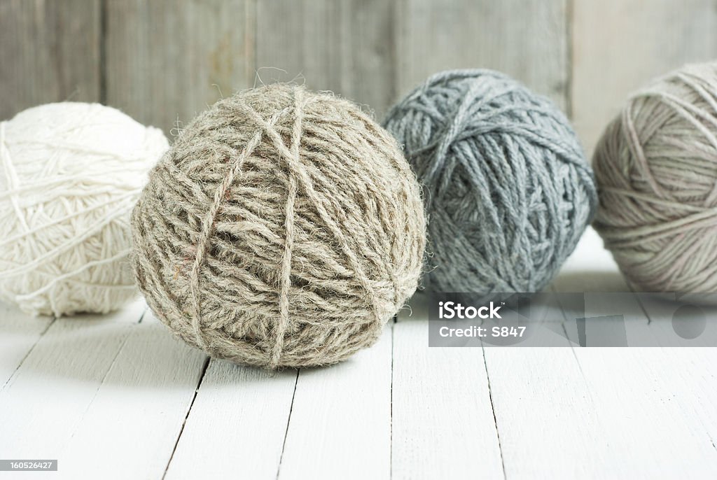 Balls of wool balls of wool on wooden background Art And Craft Stock Photo