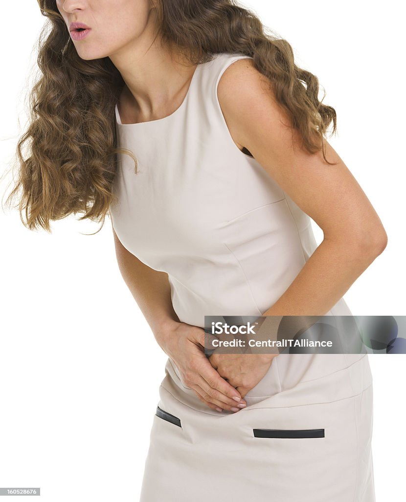 Primer plano de mujer teniendo dolor de estómago - Foto de stock de Abdomen libre de derechos