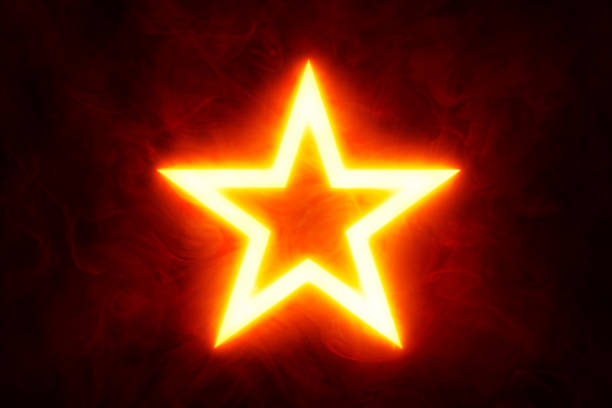 istock Neon glowing star yellow red on a black smokey background 1605287727