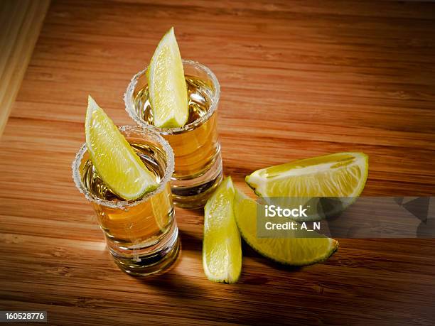 Foto de Tequila e mais fotos de stock de Amarelo - Amarelo, Bebida alcoólica, Copo