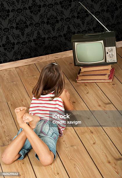 Little Girl Watching Tv Stock Photo - Download Image Now - Beauty In Nature, Brown Hair, Child