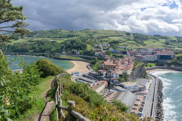 Aerial view of a mountain with fishing village in Getaria, Spain An aerial view of a mountain with fishing village in Getaria, Spain getaria stock pictures, royalty-free photos & images