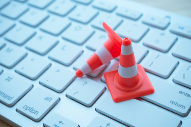 istock Maintenance, repair, under construction in computer system from virus or ransomware concept. 1605304956