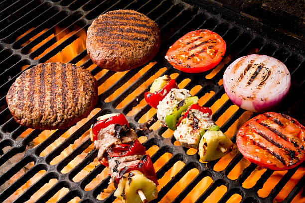 Chicken Shish Kebabs with bell pepper and grilled chicken breast and beef Grilled Burger, Tomato, Onion