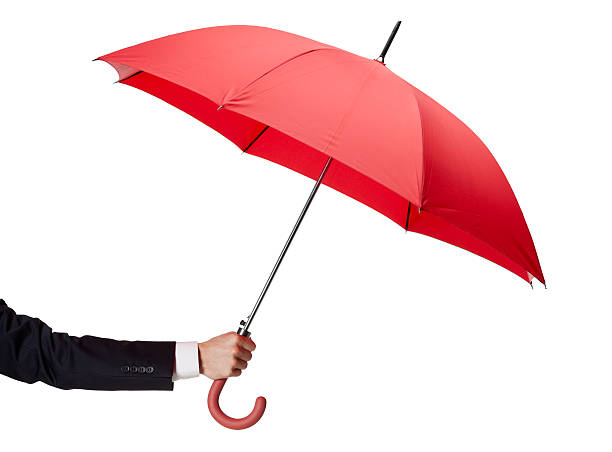 istock Close up of opened umbrella in hand 160532502