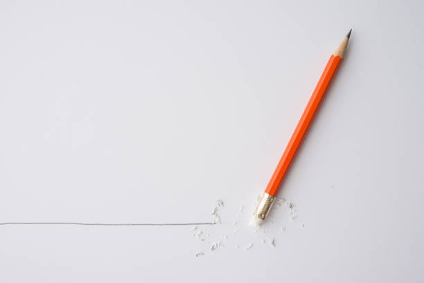 istock Flat lay of pencil eraser delete black line pencil on white paper background. 1605326530