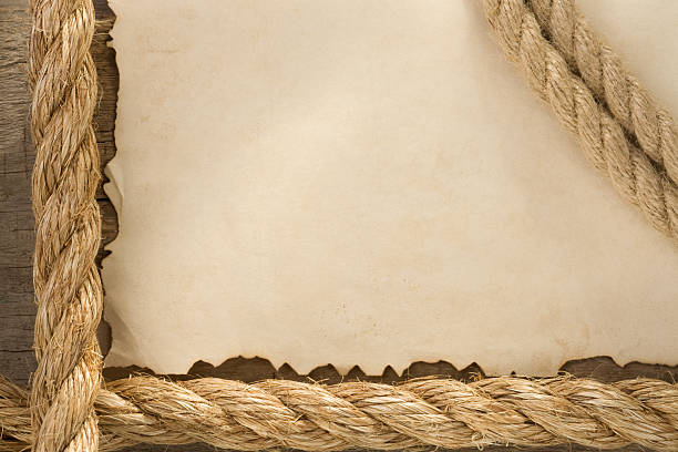istock ropes on old vintage ancient paper backgroun 160534604