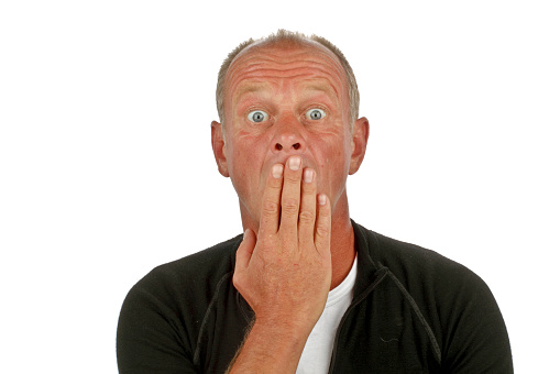 Shocked man on a white background