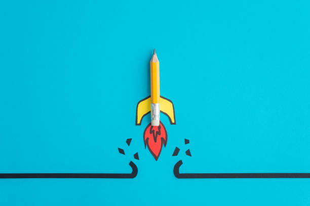 istock Yellow pencil rocket breaking through black wall obstacle on blue background minimal style. 1605370638