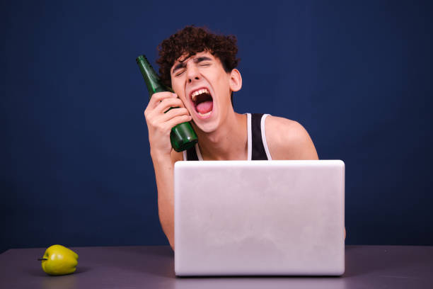 Funny silly guy chatting online Happy man perv stock pictures, royalty-free photos & images