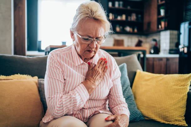 istock Senior woman having heartache. 1605404700