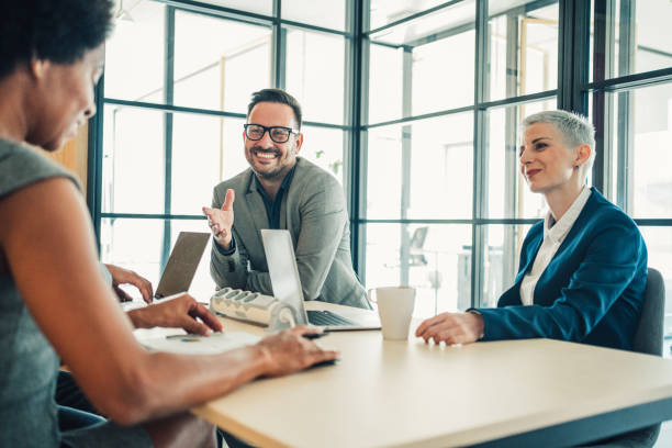istock Business persons on meeting in the office. 1605405177