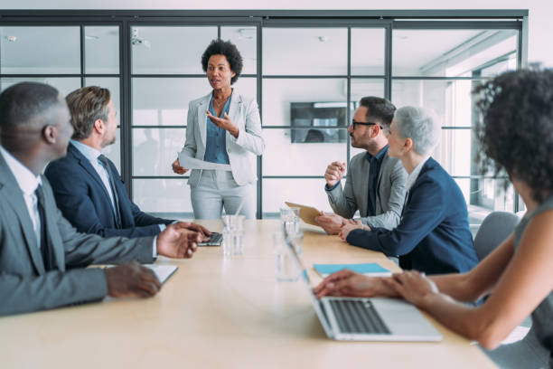 istock Business persons on meeting in the office. 1605405207