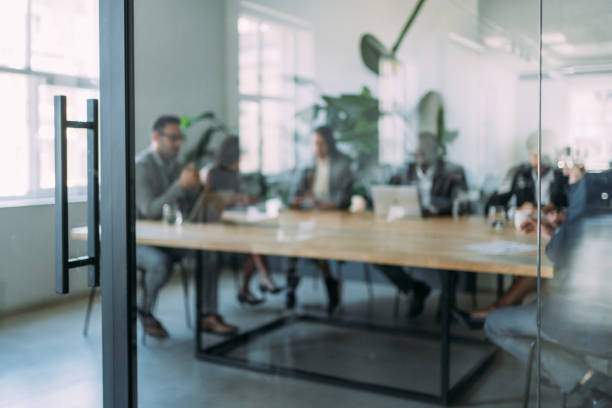 istock Business persons on meeting in the office. 1605405759