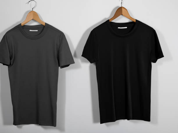 istock Realistic tshirt mockup | Blank black and white t-shirt on hanger, design mockup. Clear plain cotton tshirt mock up template. Apparel store logo mock branding display 1605408575