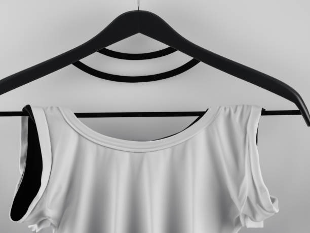 istock Realistic tshirt mockup | Blank black and white t-shirt on hanger, design mockup. Clear plain cotton tshirt mock up template. Apparel store logo mock branding display 1605410235