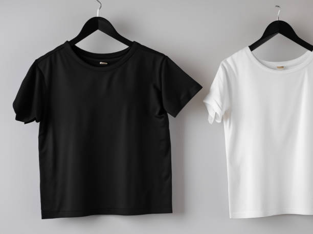 istock Realistic tshirt mockup | Blank black and white t-shirt on hanger, design mockup. Clear plain cotton tshirt mock up template. Apparel store logo mock branding display 1605410737