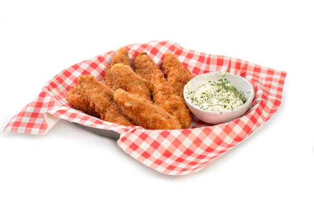 istock Breaded chicken strips  on a food tray 1605411408