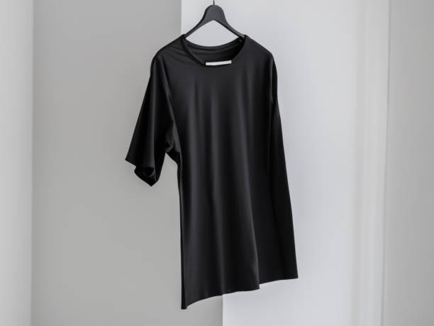 istock Realistic tshirt mockup | Blank black and white t-shirt on hanger, design mockup. Clear plain cotton tshirt mock up template. Apparel store logo mock branding display 1605415951