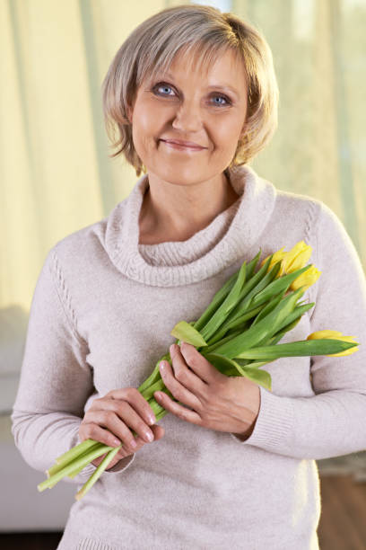 istock Woman with flowers 160541646