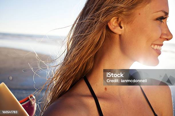 Surfer Girl Stock Photo - Download Image Now - Beach, Human Hair, Wind