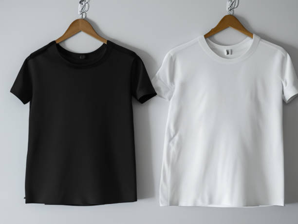 istock Realistic tshirt mockup | Blank black and white t-shirt on hanger, design mockup. Clear plain cotton tshirt mock up template. Apparel store logo mock branding display 1605418737