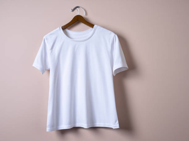 istock Realistic tshirt mockup | Blank black and white t-shirt on hanger, design mockup. Clear plain cotton tshirt mock up template. Apparel store logo mock branding display 1605418738