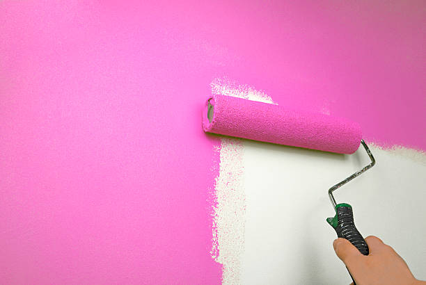 istock hand painting wall pink 160544180
