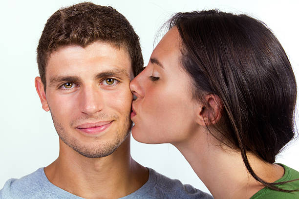 istock young couple kissing 160544248