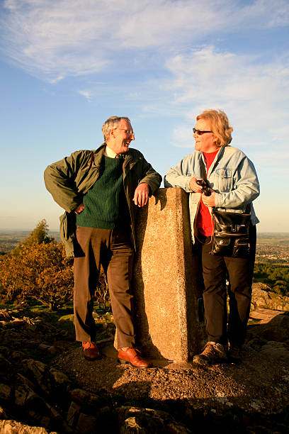 istock Happy Couple Resting on Beacon Hill Park, UK 160544419