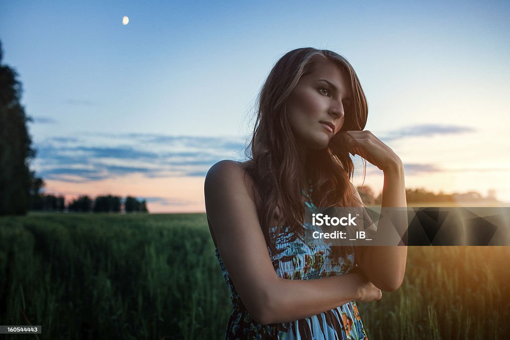 Portrait of a beautiful elegant girl at sunset Hope - Concept Stock Photo