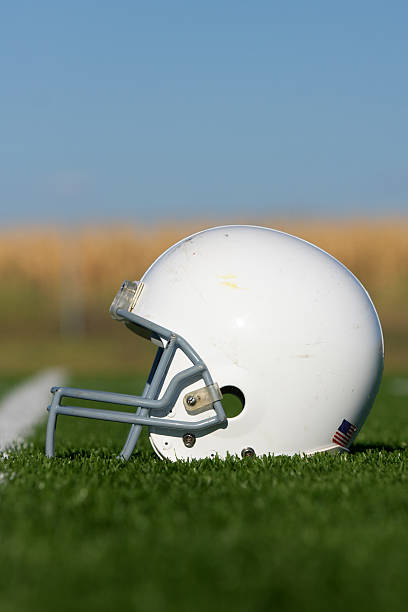 istock American Football Helmet on Field 160548005