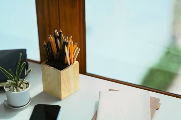 istock Pencil on pencil holder on office desk with closeup shot. 1605481173