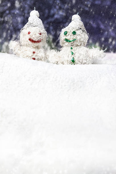 istock pair of happy snowmen 160549565