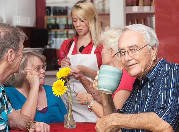 istock Man in Cafe with Friends 160549794