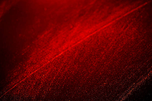 istock Black dark red orange brownbokeh shiny glitter abstract background with space. Twinkling glow stars effect. Like outer space, night sky, universe. Rusty, rough surface, grain. Abstract bokeh with red orange 1605498513