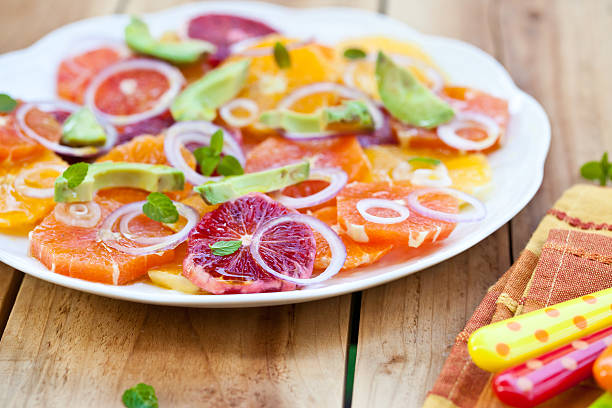 Salad with Citrus Fruits, Avocado and Onion. Ready-to-eat. Salad with Citrus Fruits, Avocado and Onion. Ready-to-eat. Also available in vertical format. valencia orange stock pictures, royalty-free photos & images