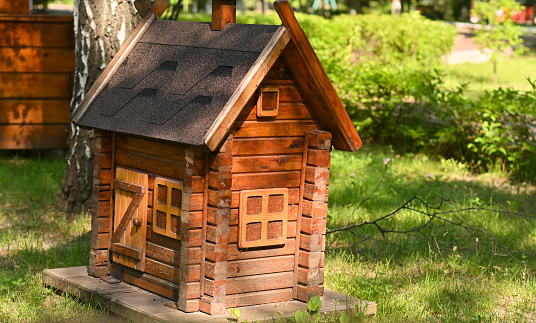 Children's wooden house in the park